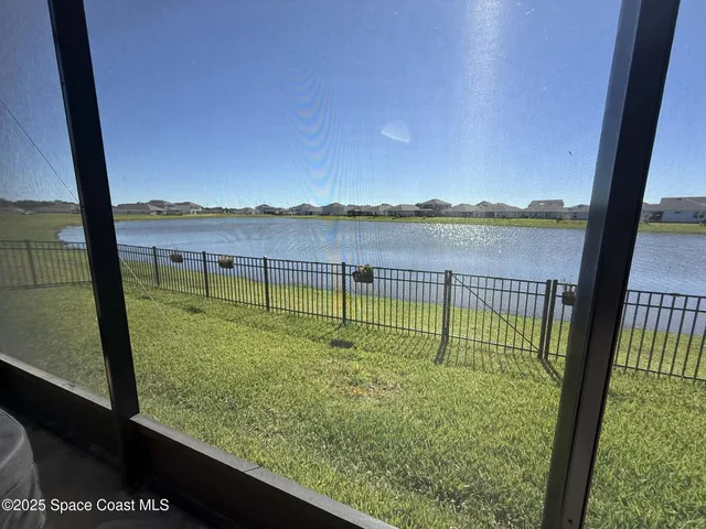 a view of swimming pool from a window