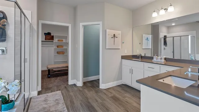 a bedroom with bed and window