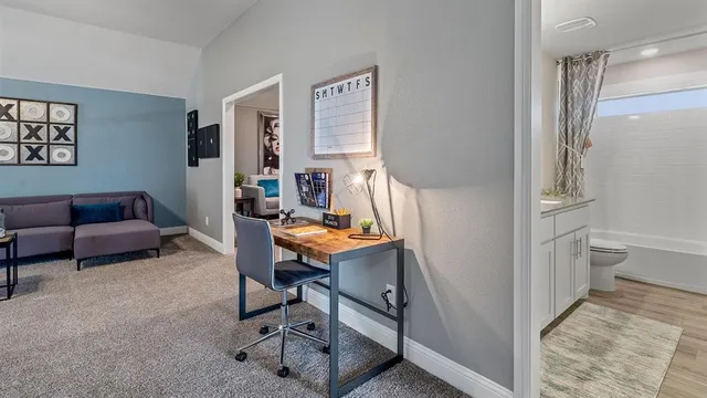 a living room with furniture and a table