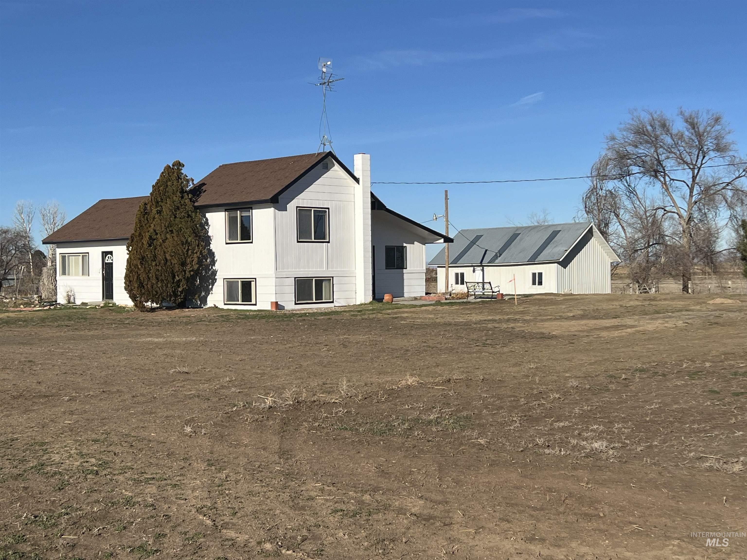 156 West 100 North Jerome, ID 83338 - Photo 1 of 15 Back of house with a chimney
