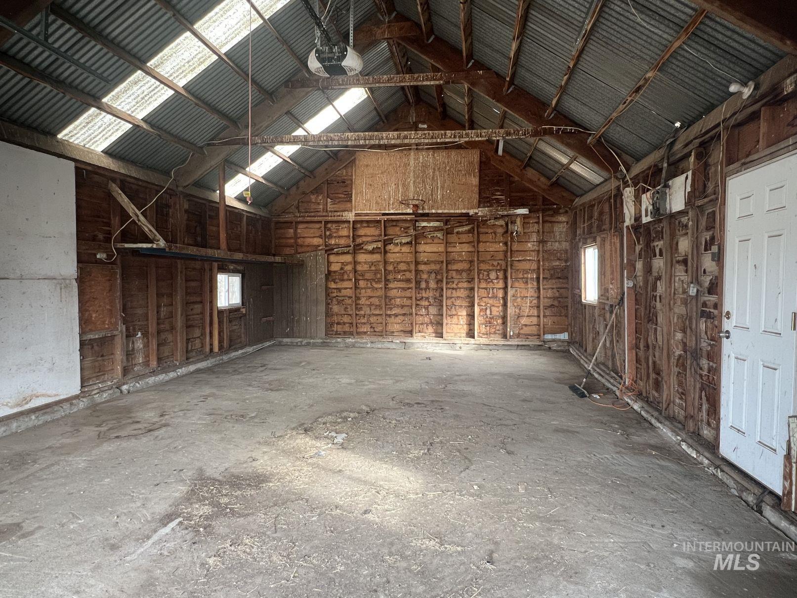 156 West 100 North Jerome, ID 83338 - Photo 15 of 15 Misc room with high vaulted ceiling and a garage