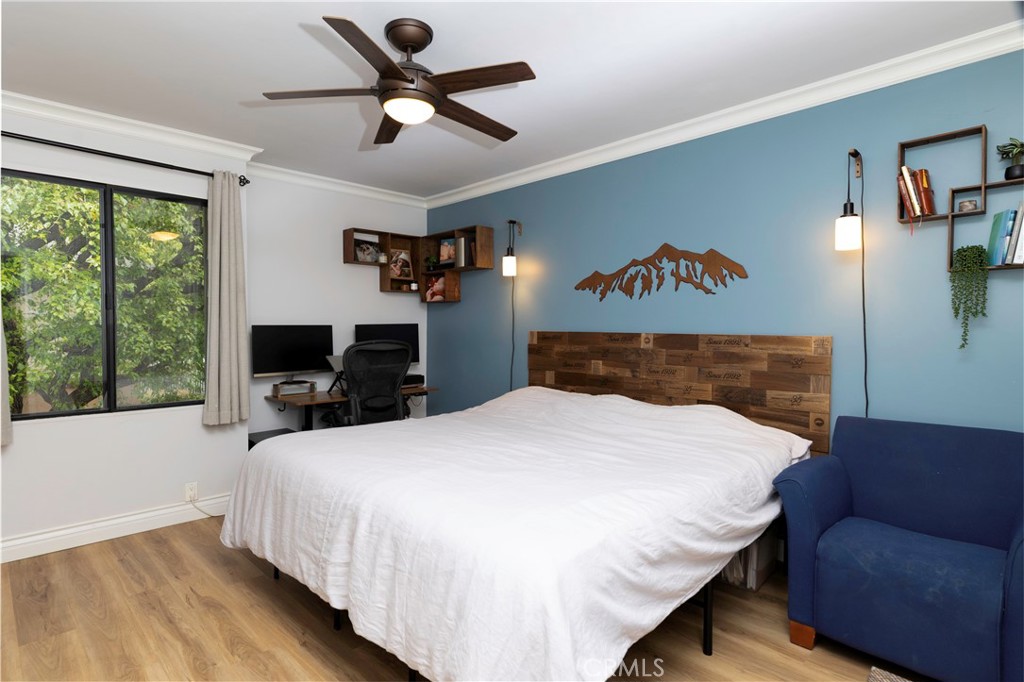 20702 El Toro Road, Unit 178 Lake Forest, CA 92630 - Photo 9 of 30 a bedroom with a bed and a large window