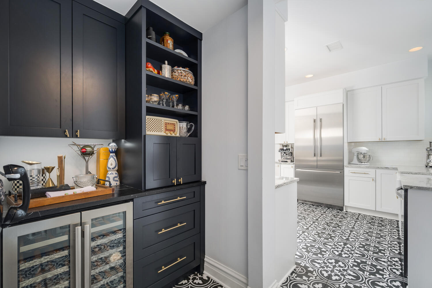 21 East Elm Street, Unit 3D Chicago, IL 60611 - Photo 16 of 27 a kitchen with a refrigerator and cabinets