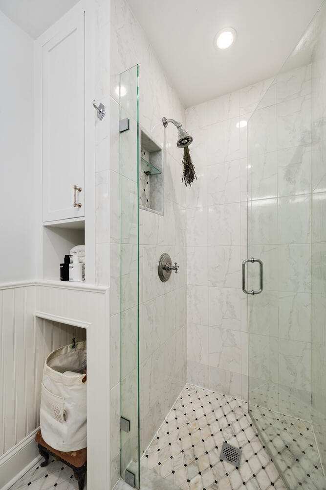 21 East Elm Street, Unit 3D Chicago, IL 60611 - Photo 21 of 27 a bathroom with a shower