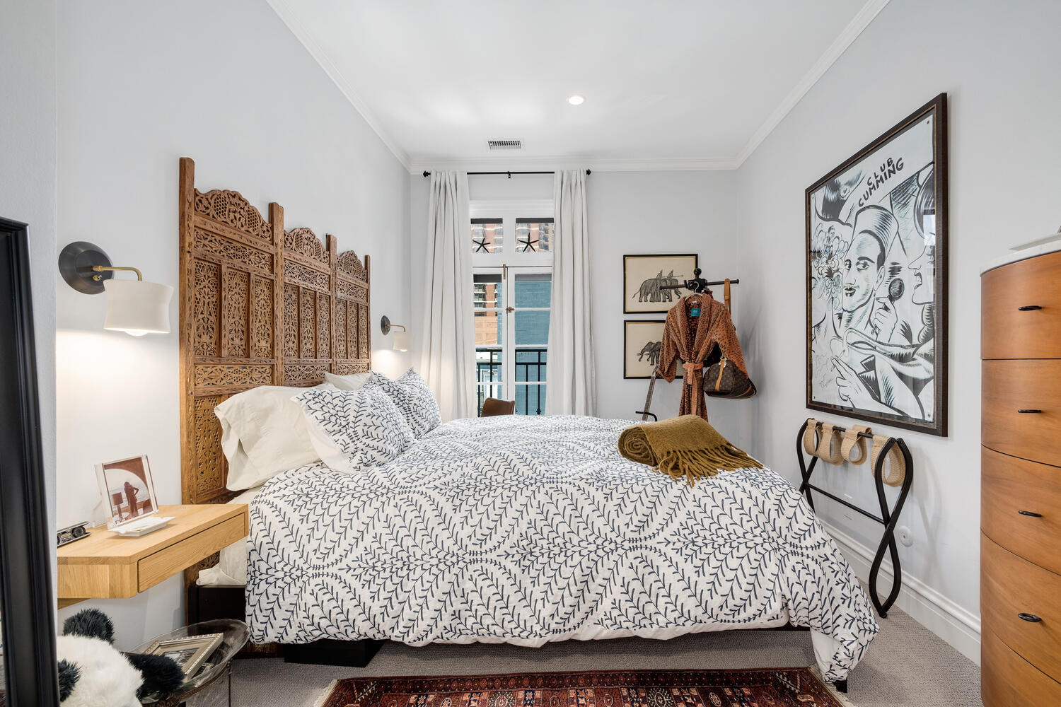 21 East Elm Street, Unit 3D Chicago, IL 60611 - Photo 23 of 27 a bedroom with a bed and a window