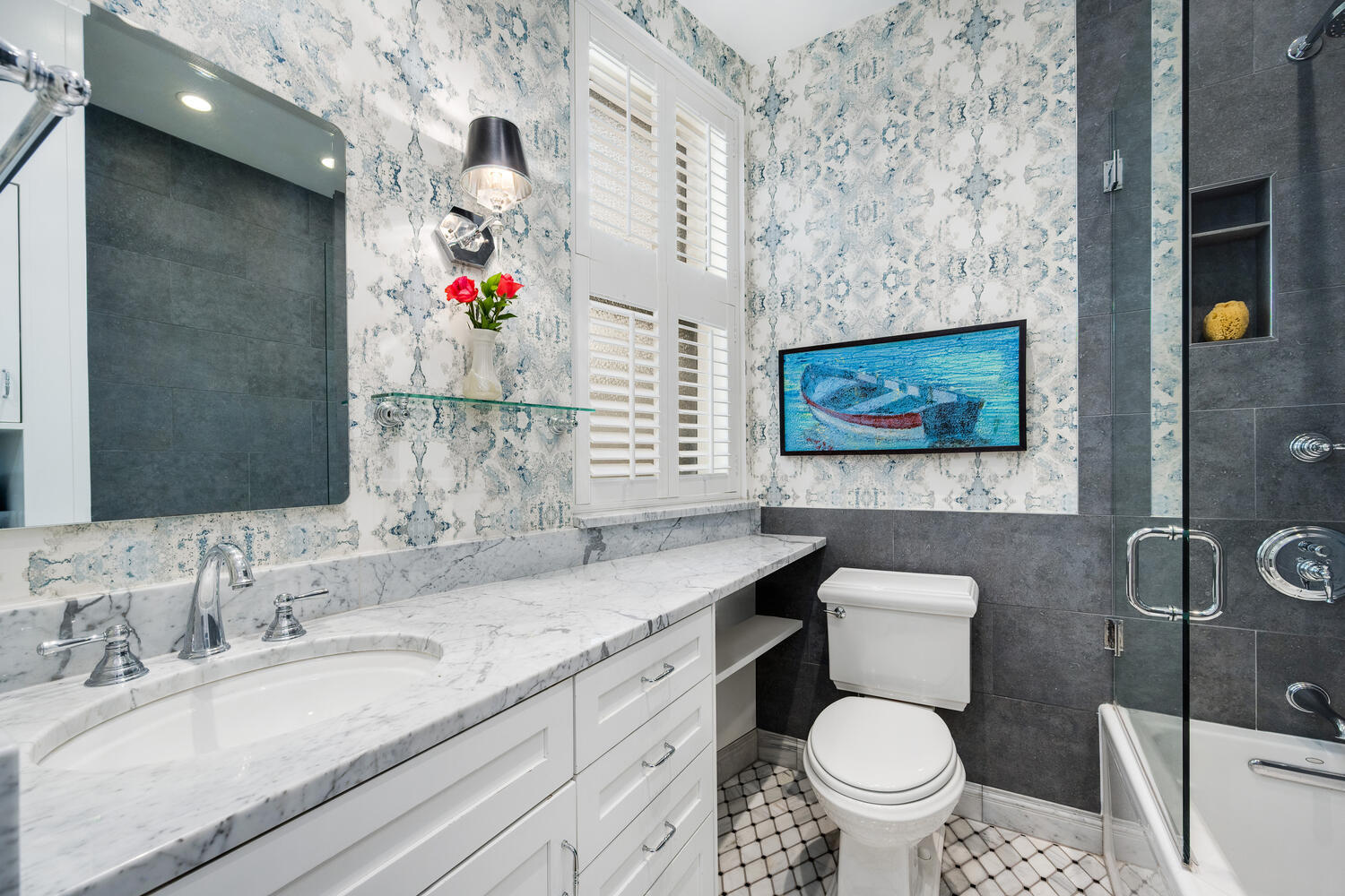 21 East Elm Street, Unit 3D Chicago, IL 60611 - Photo 24 of 27 a bathroom with a toilet sink and mirror