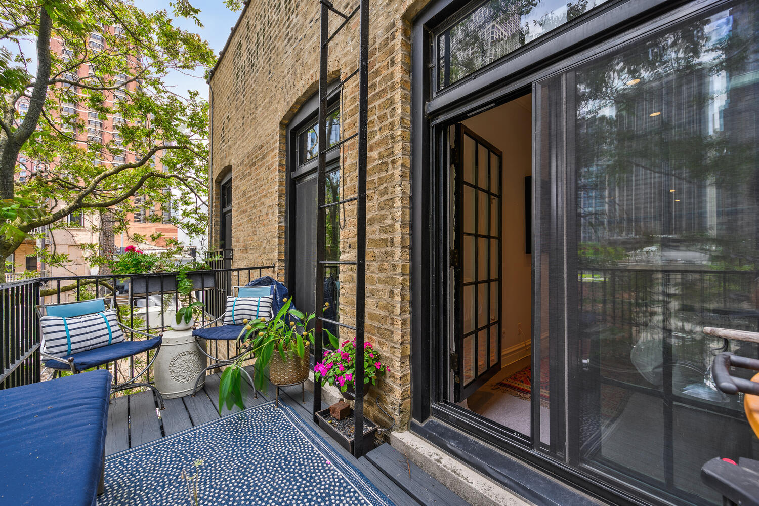 21 East Elm Street, Unit 3D Chicago, IL 60611 - Photo 26 of 27 a view of balcony with a potted plant