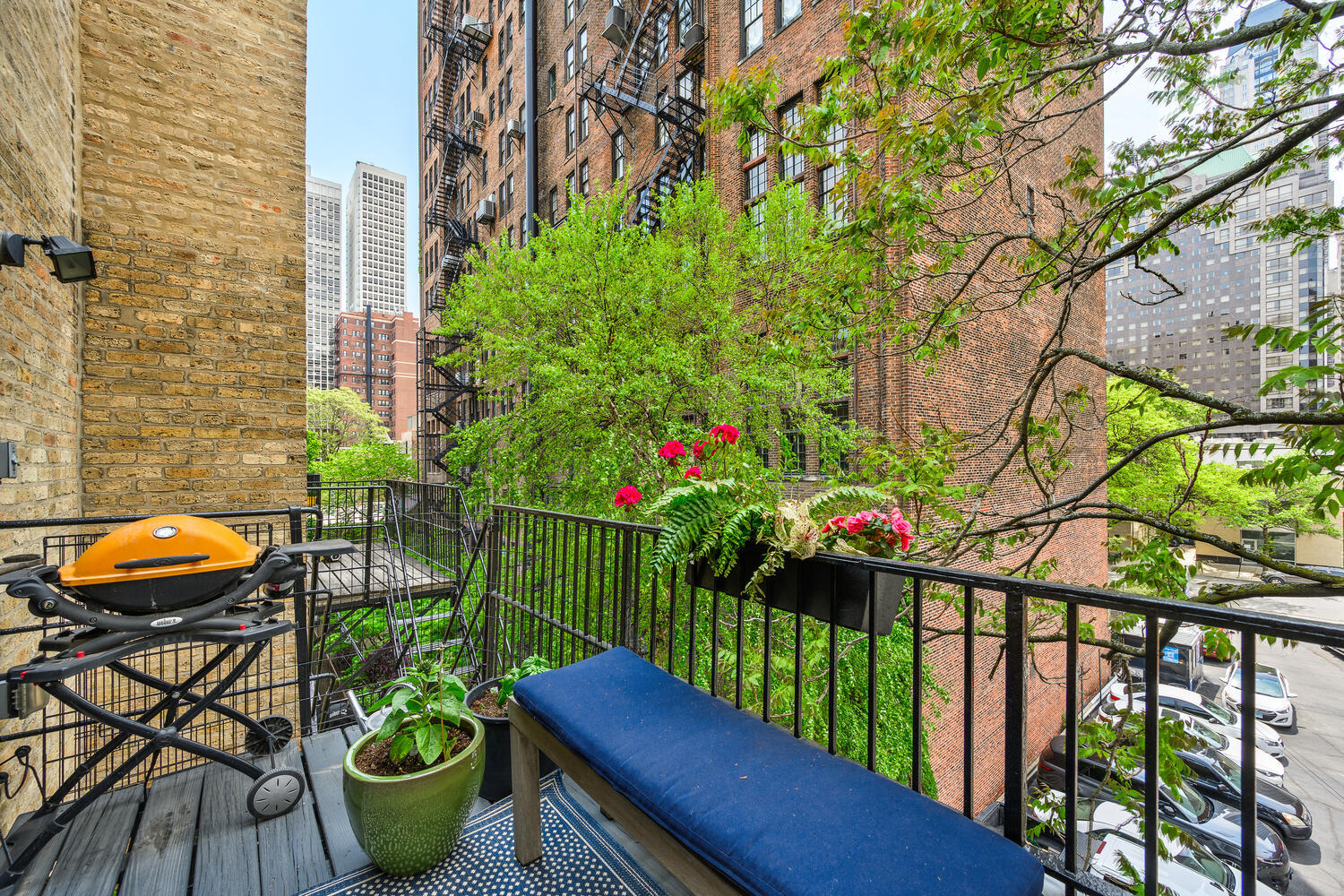21 East Elm Street, Unit 3D Chicago, IL 60611 - Photo 27 of 27 a view of a chair and table in the balcony
