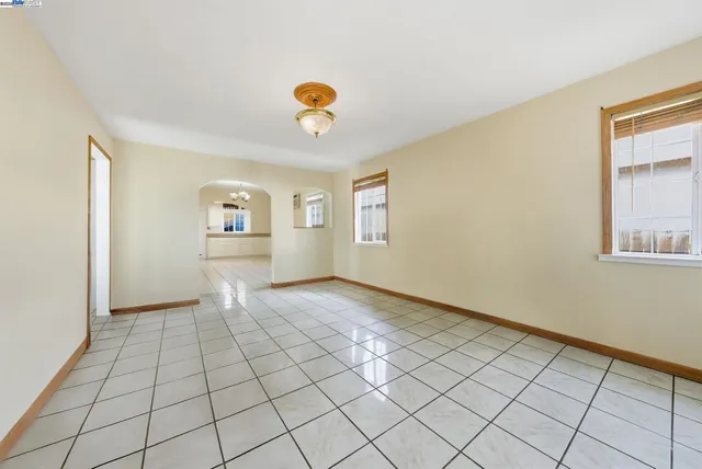 a view of an empty room and window