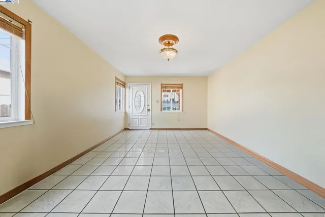 a view of an empty room and window