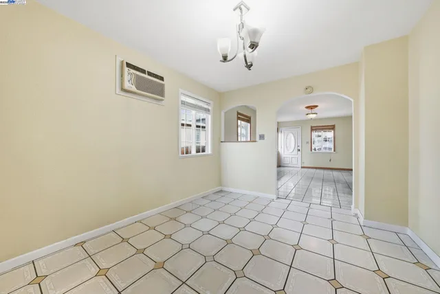 a view of an empty room and window