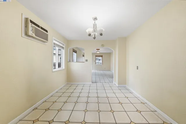 a view of a livingroom with chandelier