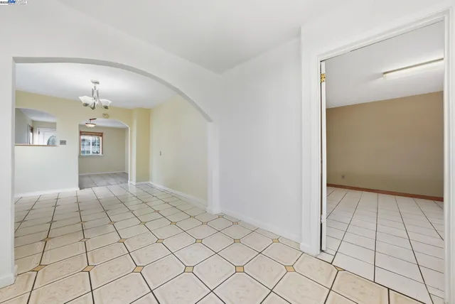 a kitchen with stainless steel appliances a refrigerator sink and cabinets