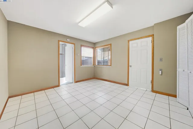 a view of an empty room and window