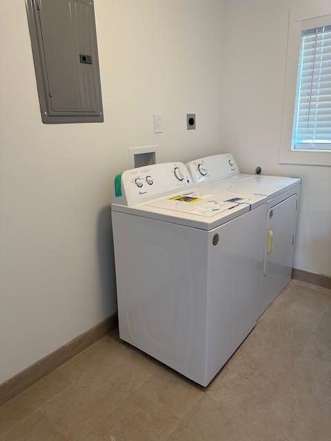 3166 Southeast Garden Street, Unit 3166 Stuart, FL 34997 - Photo 8 of 10 a utility room with dryer and washer