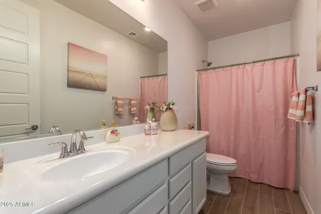 a bedroom with a bed and closet