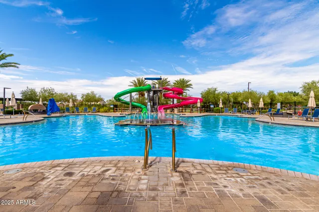 a living room with fireplace furniture and a flat screen tv