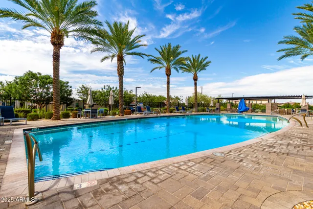 an outdoor space with seating area and potted plants