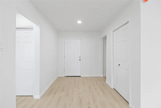 a view of a livingroom with wooden floor