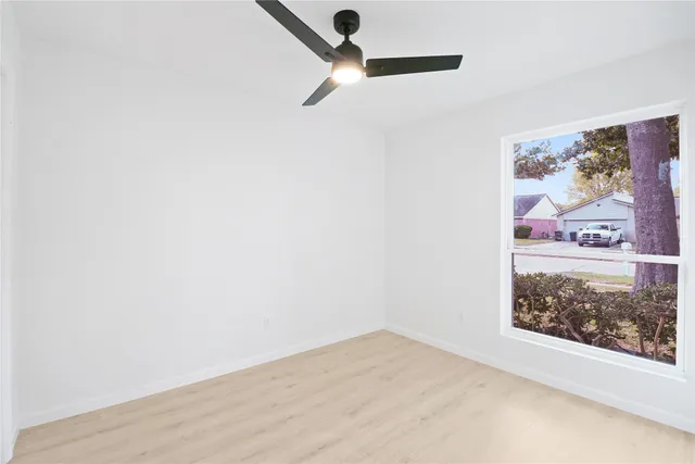 a view of a hallway with a fan