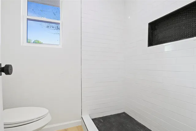 a bathroom with a toilet