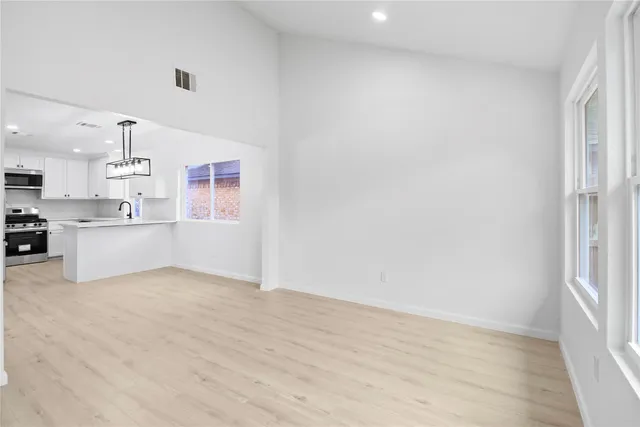 a view of a kitchen with a sink