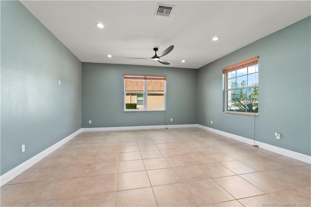 1455 Southeast Conference Circle Stuart, FL 34997 - Photo 11 of 69 a view of an empty room with a window