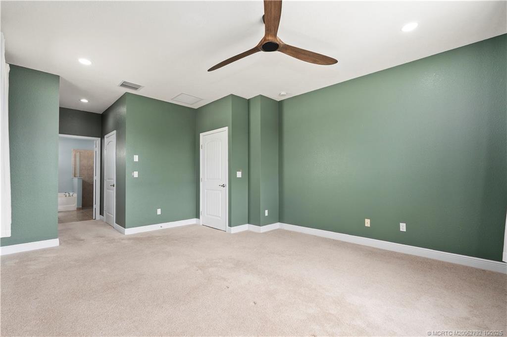 1455 Southeast Conference Circle Stuart, FL 34997 - Photo 25 of 69 a view of a livingroom with a chandelier fan