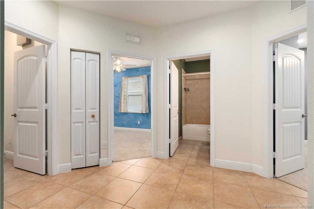 1455 Southeast Conference Circle Stuart, FL 34997 - Photo 33 of 69 a view of a hallway with closet area