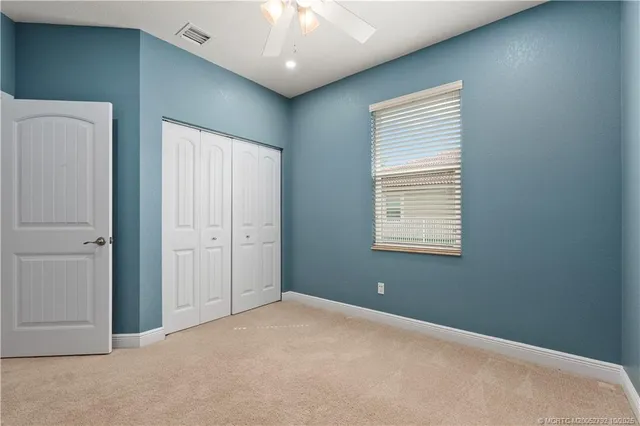 a aerial view of a house with a lake view
