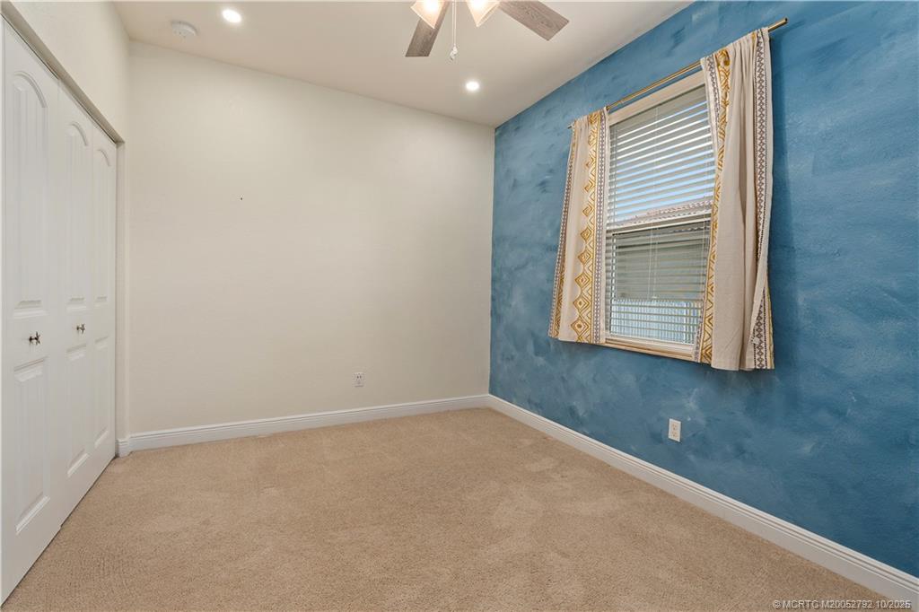 1455 Southeast Conference Circle Stuart, FL 34997 - Photo 37 of 69 a view of an empty room with a window