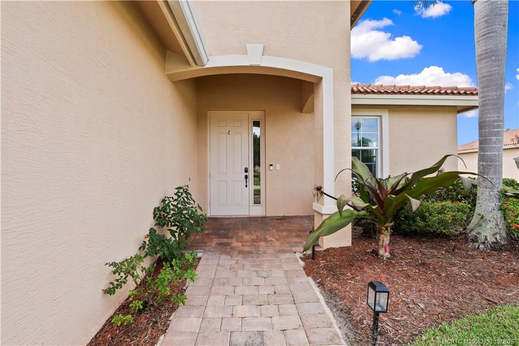 1455 Southeast Conference Circle Stuart, FL 34997 - Photo 4 of 69 a view of a entryway door of the house