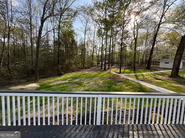 a view of a wooden roof deck