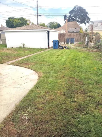 a view of a lake with a big yard