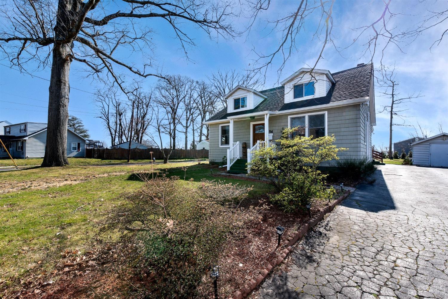 56 Half Acre Road Jamesburg, NJ 08831 - Photo 3 of 31 a view of a house with a yard
