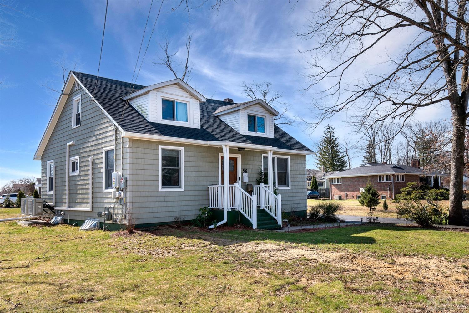 56 Half Acre Road Jamesburg, NJ 08831 - Photo 4 of 31 a front view of house with yard