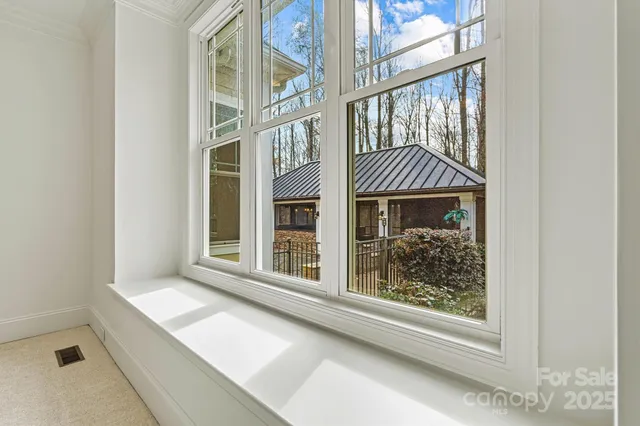 a front view of a house with a glass door