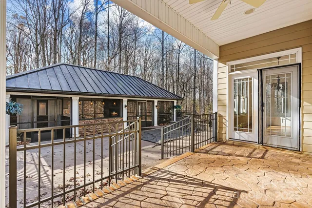 a view of an empty room with a fireplace
