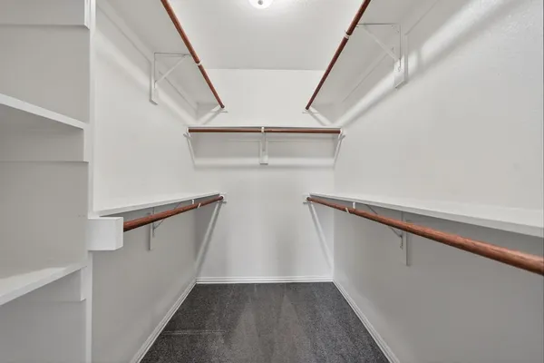 a view of entryway with stairs and wooden floor