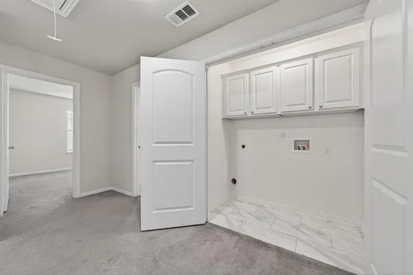 a picture of a bathroom with a shower