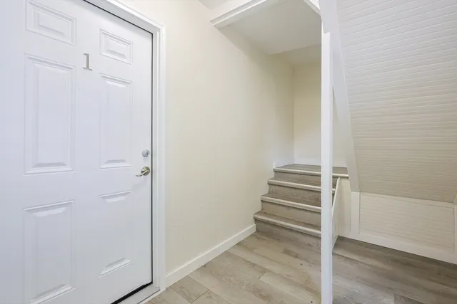 a view of entryway with stairs