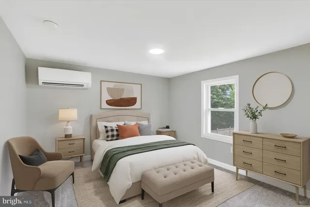 a bedroom with a bed and window