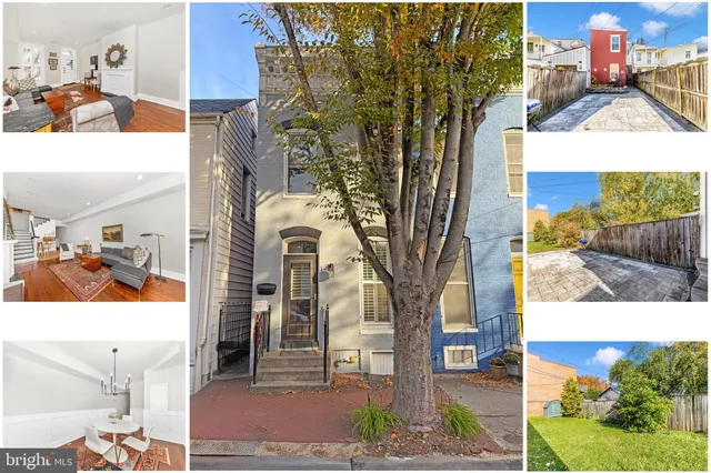 a view of residential houses and trees