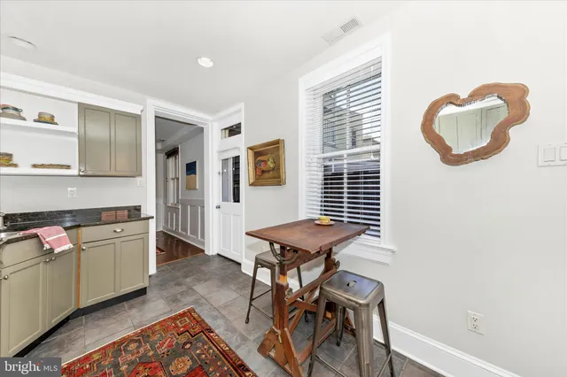 a room with furniture and a window