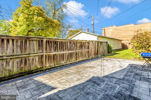 a view of a house with wooden stairs