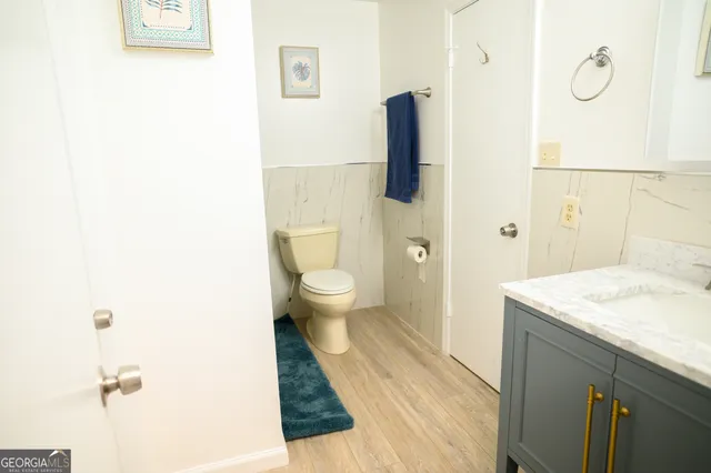 a bathroom with a sink and a toilet