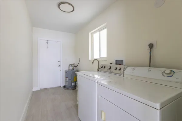 view of a hallway with closet