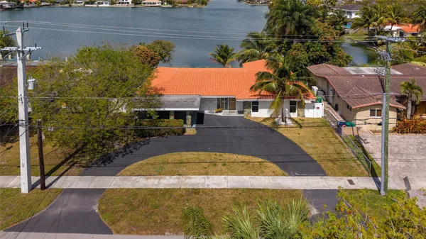 view of a house with a yard