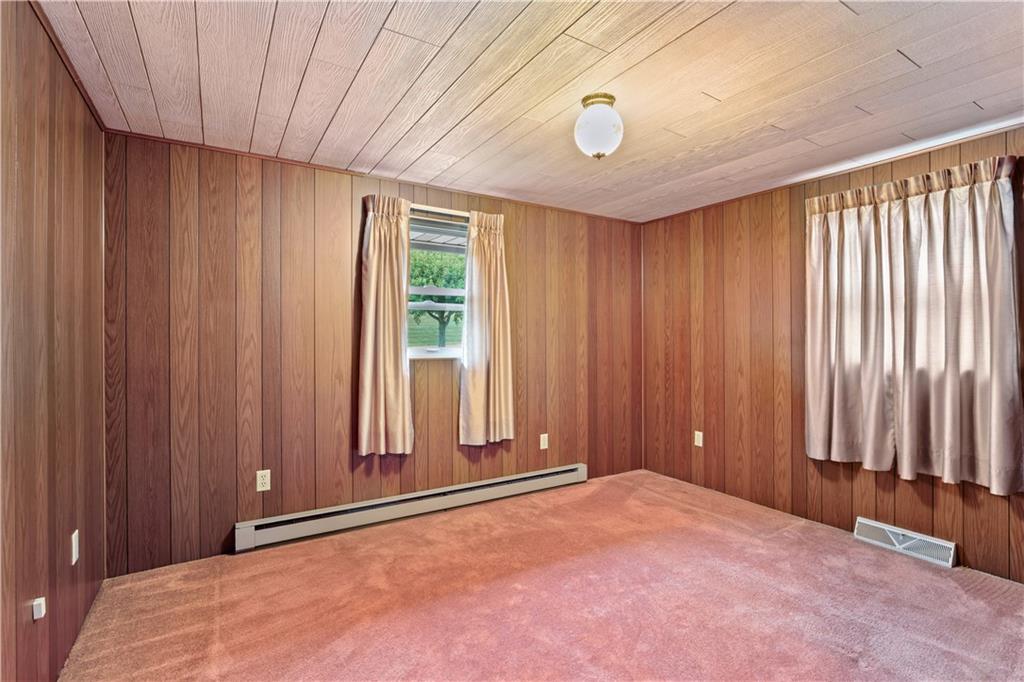 222 McConnell Road Mount Pleasant, PA 15666 - Photo 19 of 37 a view of an empty room with a window
