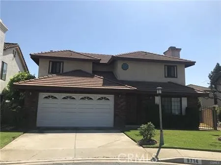 a view of a house with a garage